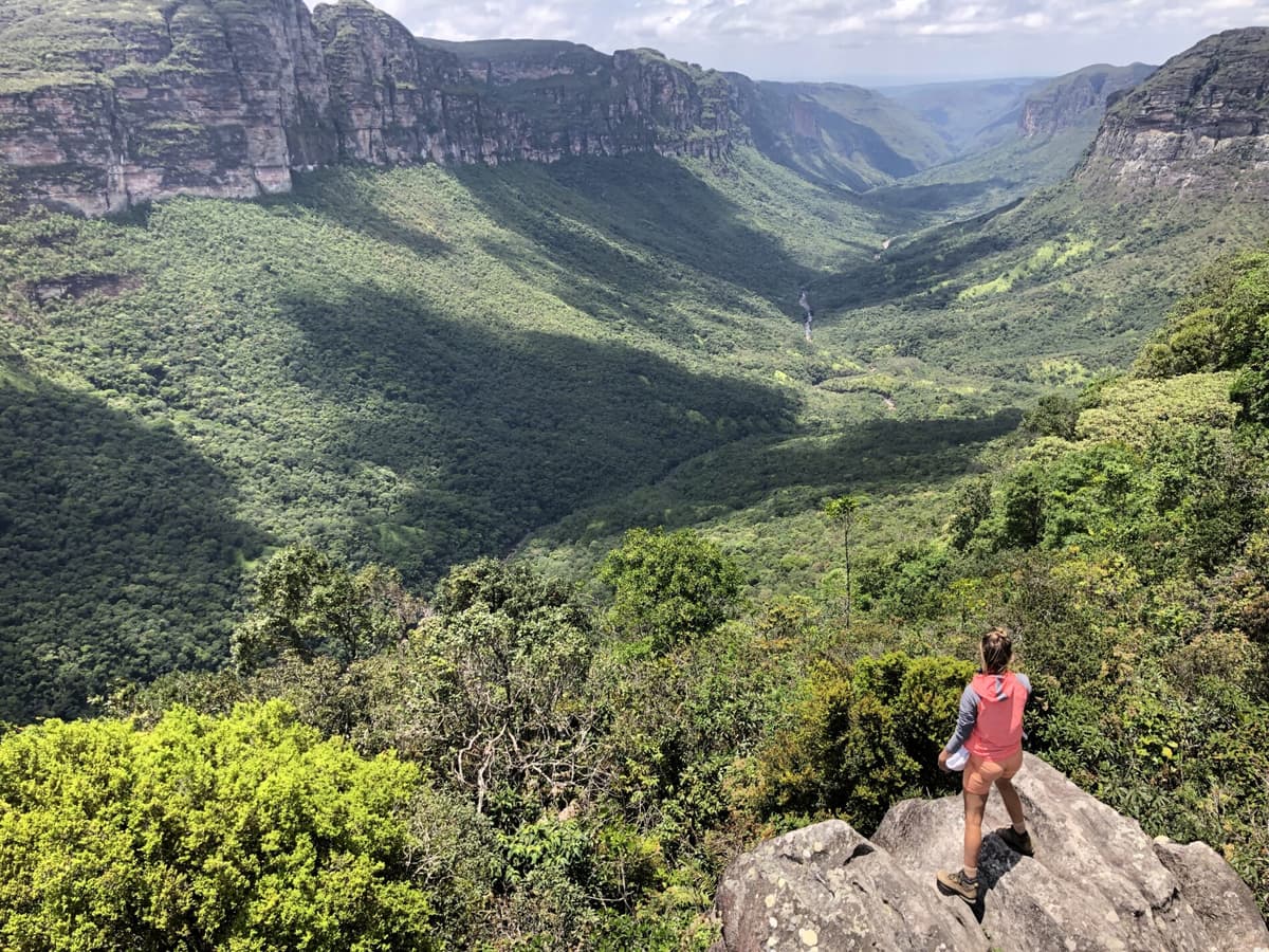 Fernanda walking through the canyon scenery of Chapada Diamantina on her own