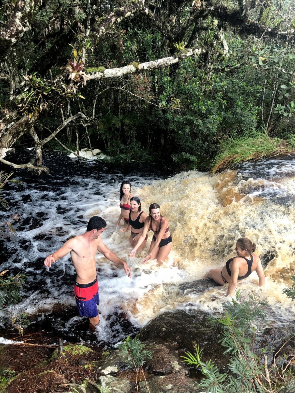 The adventure group enjoying their evening together in Vale do Pati