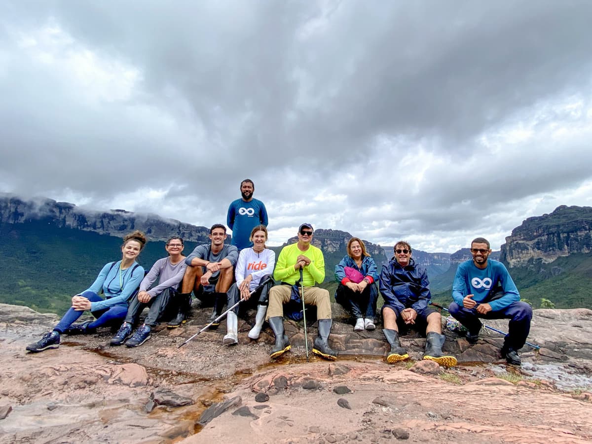 Adventurers crossing the rugged terrain of Vale do Pati during their hike