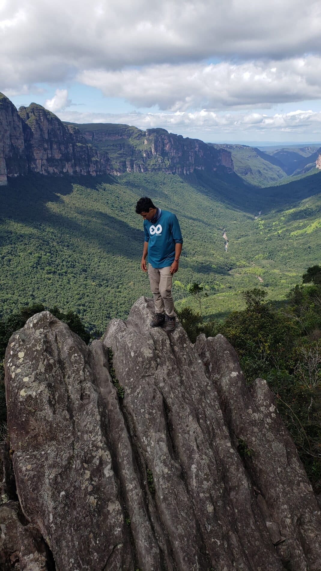 Lucas Neves and Ole trekking across a rocky landscape in Chapada Diamantina