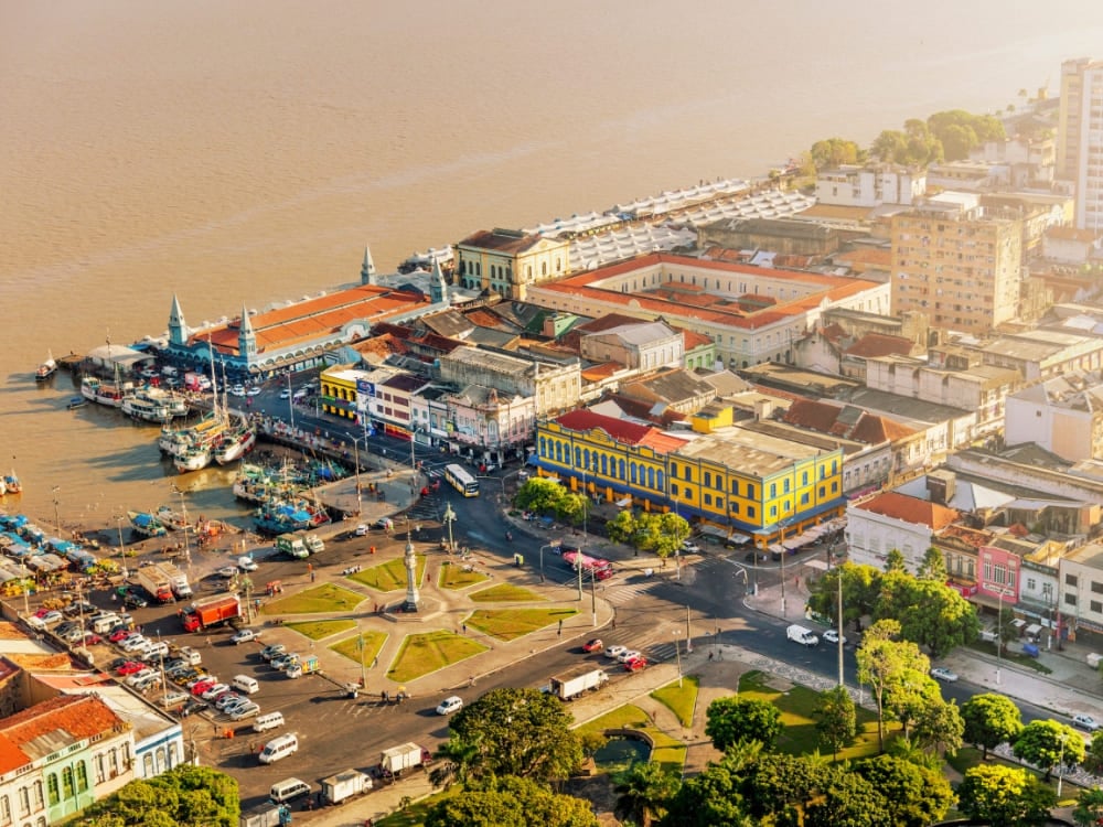 Aerial view of the historic Ver-o-Peso market and docked boats on the riverfront in Belém do Pará.