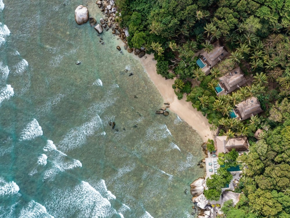 Waves roll onto the shore of Nikoi Island in Indonesia's protected marine area