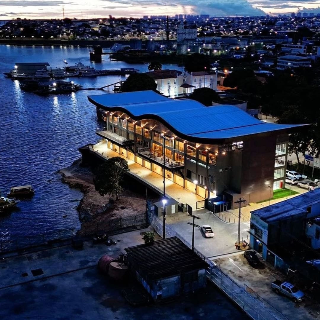Night view of the illuminated Lúcia Almeida Viewpoint building reflected in the river water in Manaus. Night view of the illuminated Lúcia Almeida Viewpoint building reflected in the river water in Manaus.