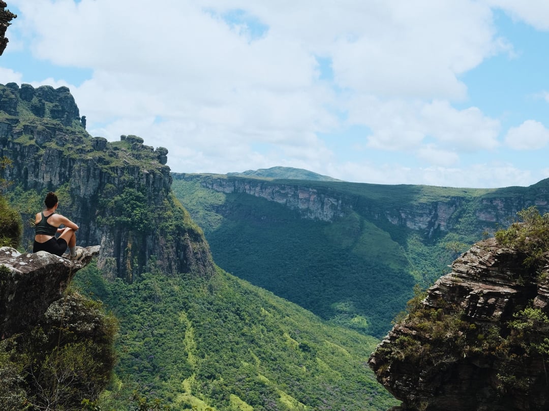 Trekkers walk through the mountain valleys of Vale do Pati in Chapada Diamantina Trekkers walk through the mountain valleys of Vale do Pati in Chapada Diamantina