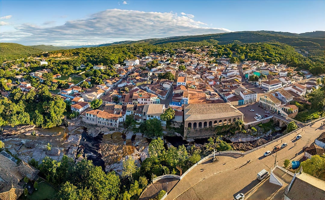 Aerial view of Lençóis showing 19th-century colonial houses, stone bridges, and the river winding through the town. Aerial view of Lençóis showing 19th-century colonial houses, stone bridges, and the river winding through the town.