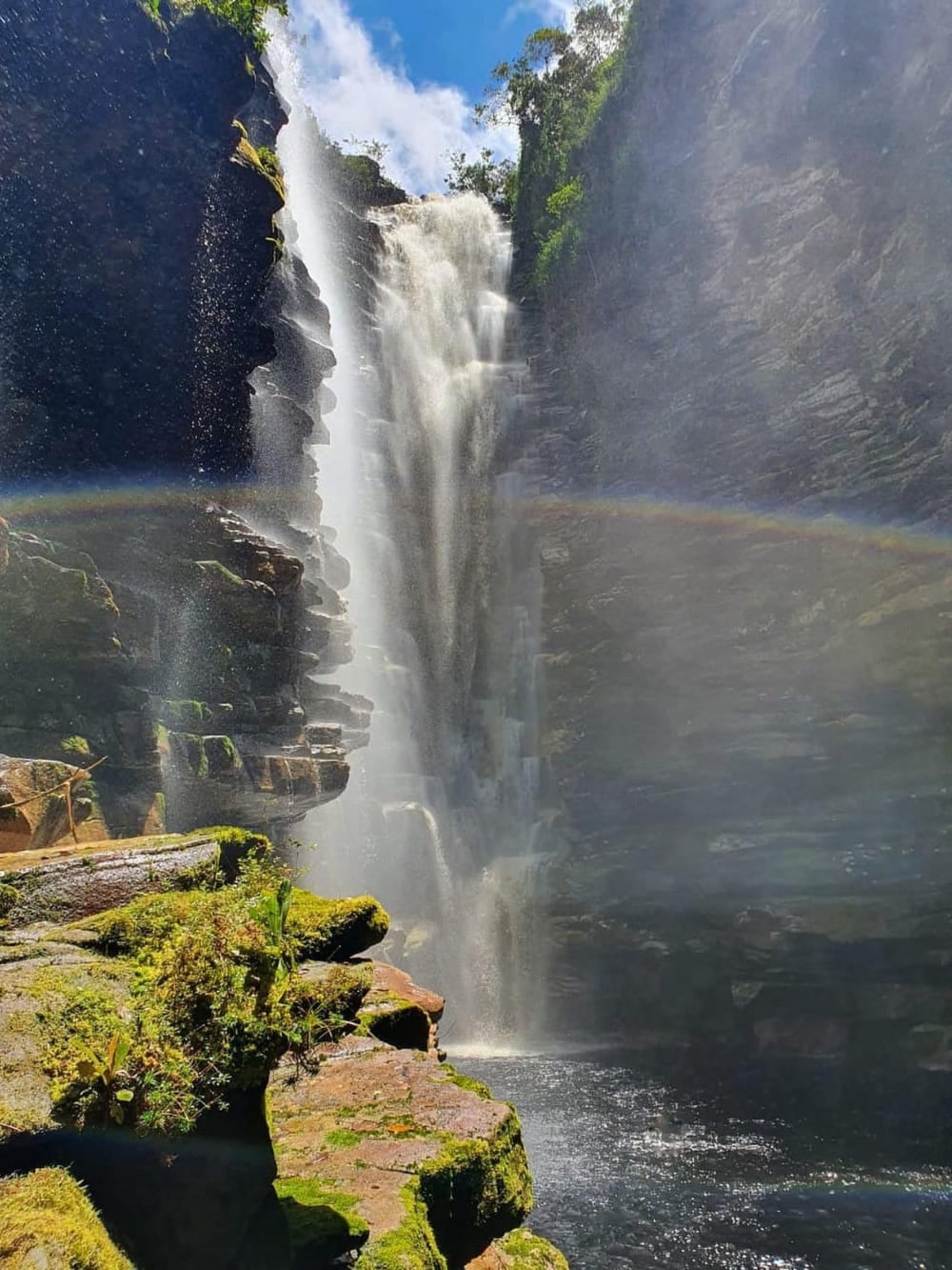 A bright rainbow forms in the mist of Mixila Waterfall, an 80-meter drop hidden deep inside a narrow rocky canyon. A bright rainbow forms in the mist of Mixila Waterfall, an 80-meter drop hidden deep inside a narrow rocky canyon.