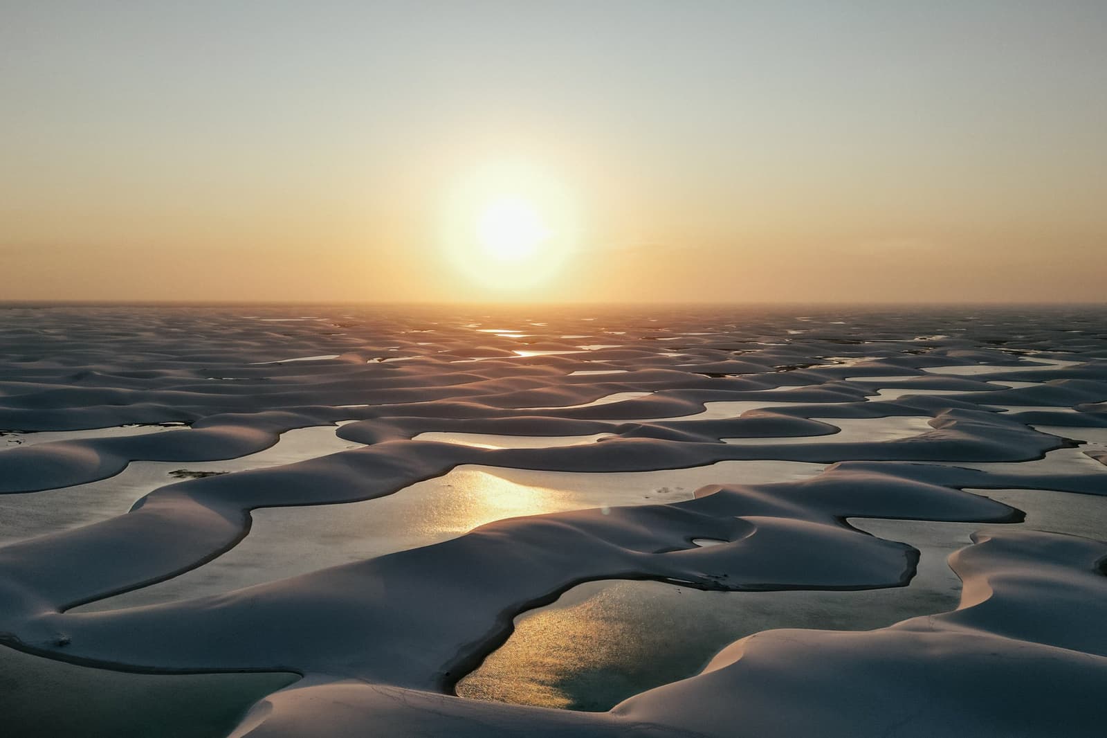 Golden hour hits differently when the whole desert is holding water. Photo: Drs Producoes Photo 1