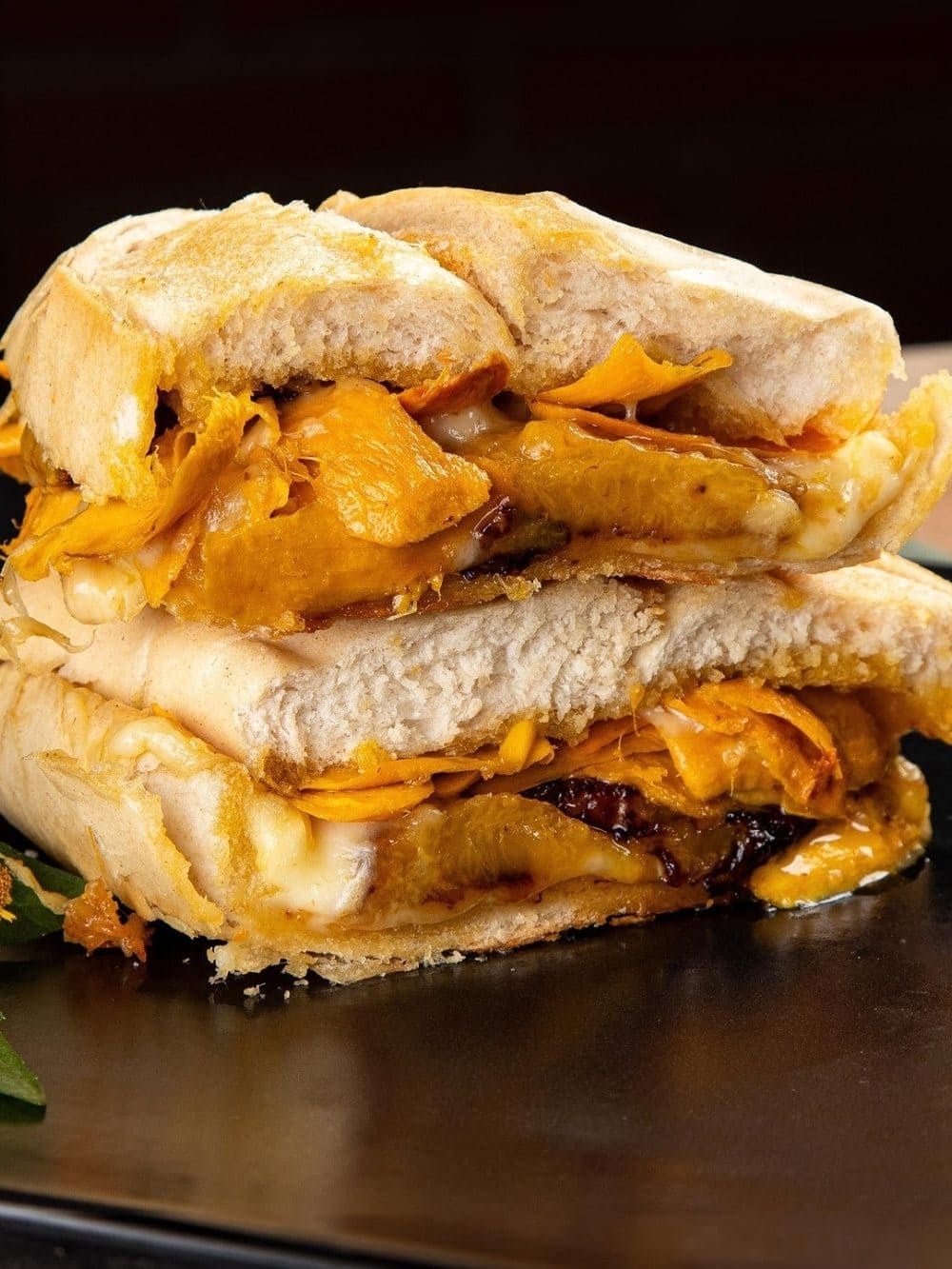 @yasaibrasil X-caboquinho-style sandwich: a French roll filled with orange Amazonian pulp and melted queijo coalho